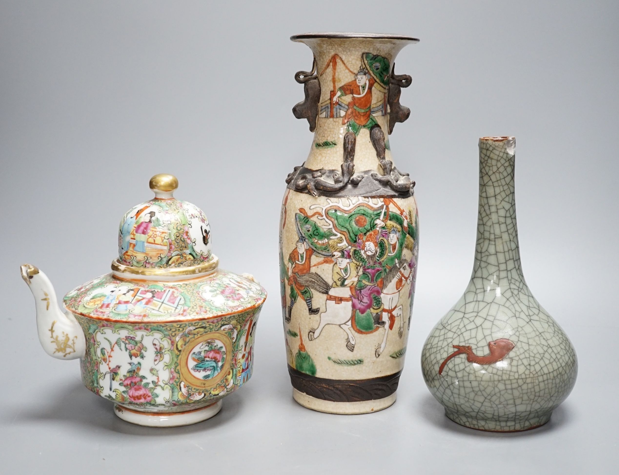 A Chinese famille rose crackleglaze vase, 29cm, together with a famille rose teapot and a crackleglaze celadon ground bottle vase